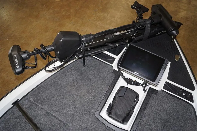 Slide: The Image of Phoenix 920 Elite X 2026 boat with Garmin electronics and trolling motor setup. - 14