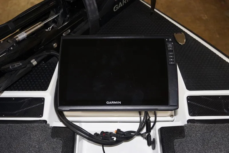 Slide: The Image of Garmin display on 2026 Phoenix 920 Elite X boat dashboard. - 15