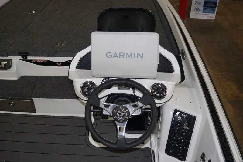 Slide: The Image of Cockpit of 2026 Phoenix 920 Elite X boat with Garmin navigation system. - 23