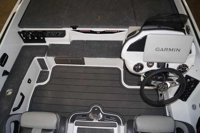 Slide: The Image of Interior of 2026 Phoenix 920 Elite X boat with Garmin navigation system. - 24