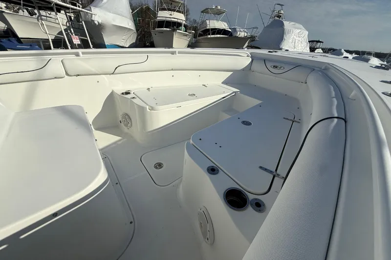 Slide: The Image of 2017 Sea Hunt Gamefish 30 boat interior with seating and storage compartments. - 11