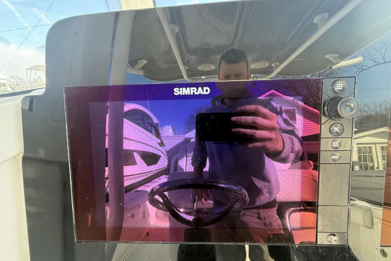 Slide: The Image of Reflection on Simrad display of 2017 Sea Hunt Gamefish 30 boat console. - 6