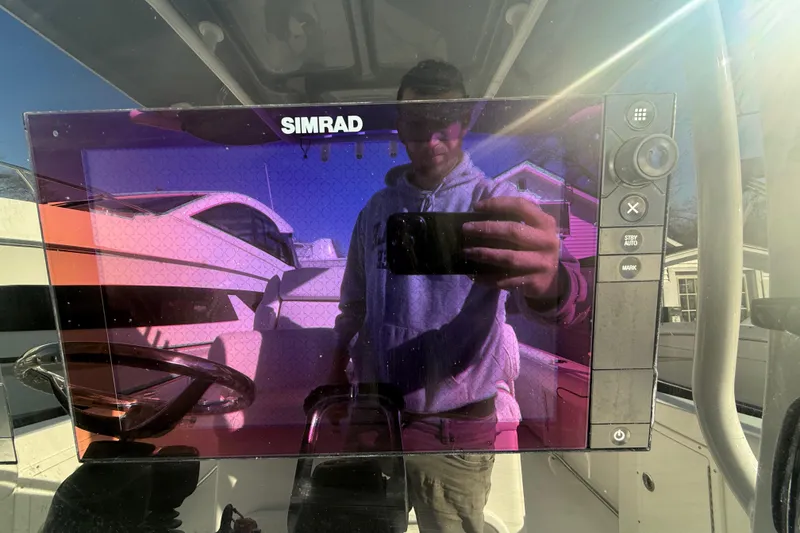 Slide: The Image of Reflection on Simrad display aboard 2017 Sea Hunt Gamefish 30 boat. - 7