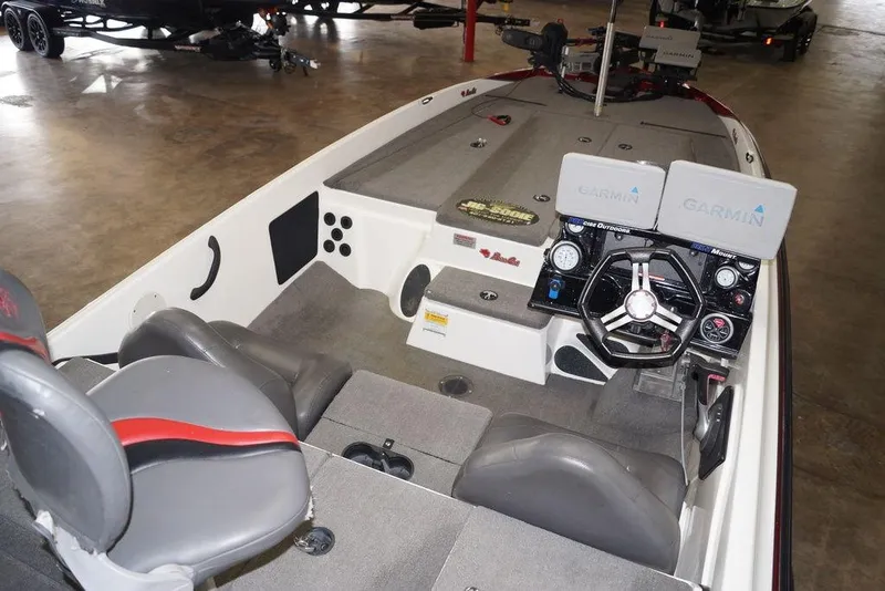 Slide: The Image of 2018 Bass Cat Pantera II boat interior with Garmin electronics and dual seating. - 11