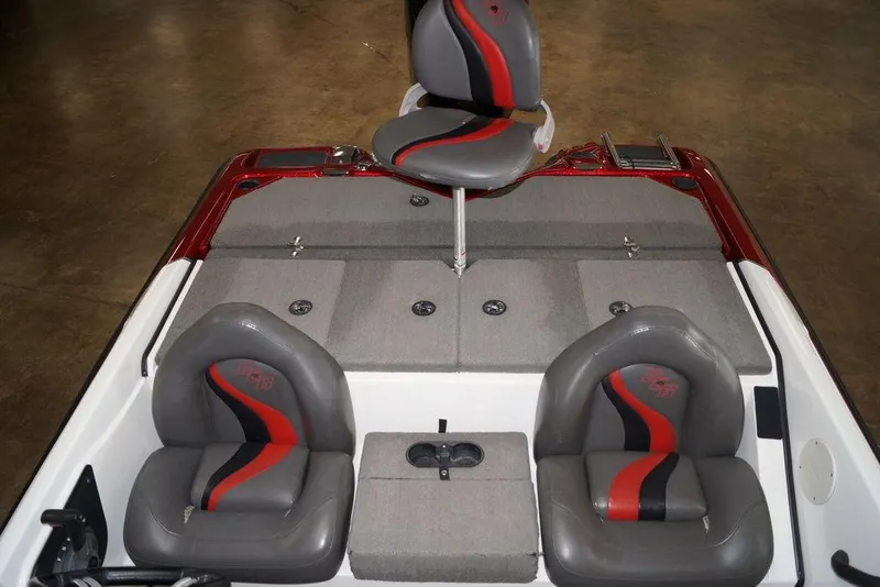 Slide: The Image of 2018 Bass Cat Pantera II boat interior with gray and red seating. - 12