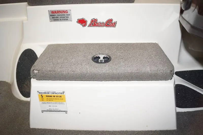 Slide: The Image of 2018 Bass Cat Pantera II boat step with warning and capacity labels. - 16