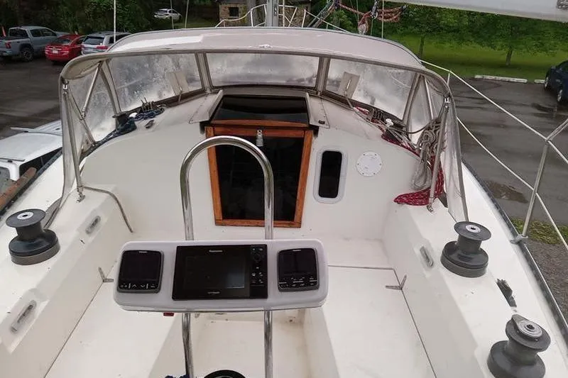 Slide: The Image of 1979 C & C 36-1 sailboat cockpit with navigation equipment and winches. - 2