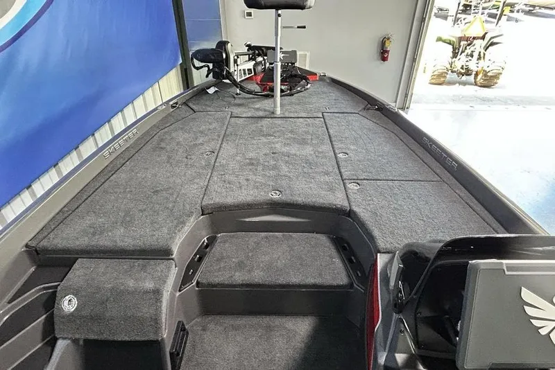 Slide: The Image of 2026 Skeeter ZXE20 boat interior with spacious deck and modern design. - 16