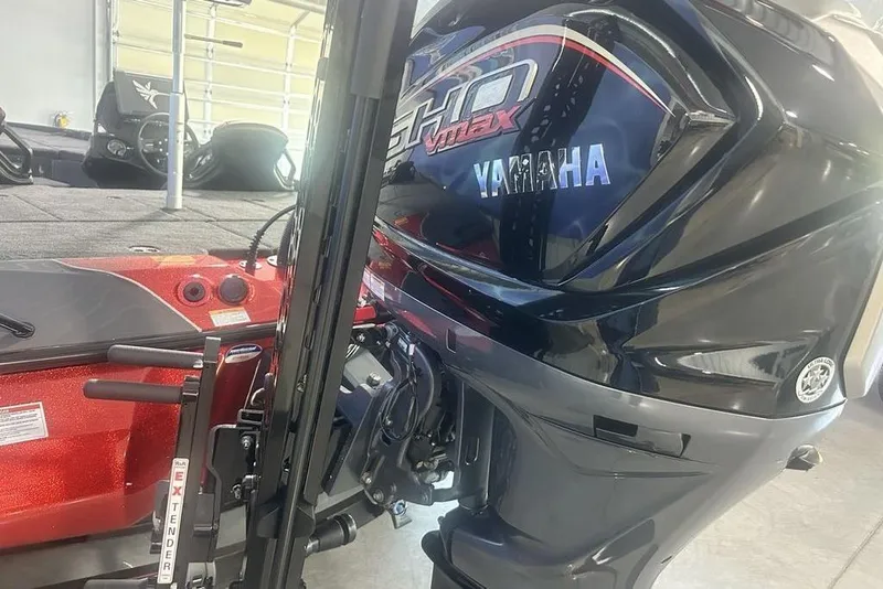 Slide: The Image of 2026 Skeeter ZXE20 boat with Yamaha motor in a showroom. - 21