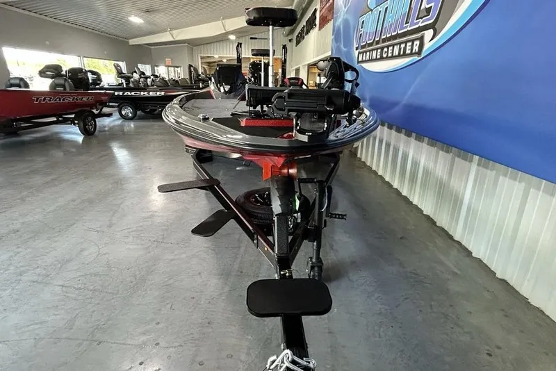 Slide: The Image of 2026 Skeeter ZXE20 boat displayed in showroom, featuring modern design and advanced equipment. - 4