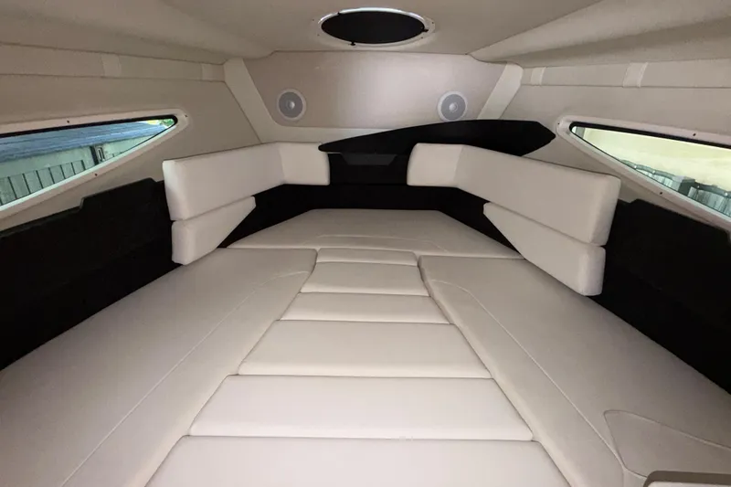 Slide: The Image of Luxurious interior cabin of 2023 Regal 26 XO boat with plush seating. - 136