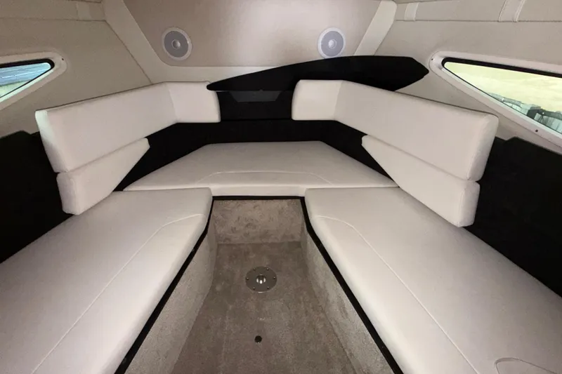 Slide: The Image of 2023 Regal 26 XO cabin interior with white seating and modern design. - 143