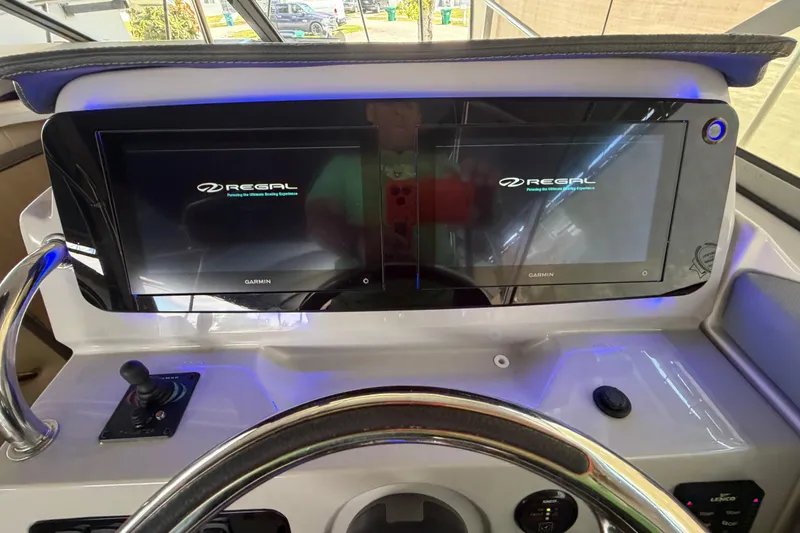Slide: The Image of Dashboard of 2023 Regal 26 XO boat with dual Garmin displays. - 149