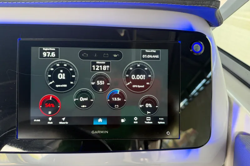 Slide: The Image of Garmin display on 2023 Regal 26 XO boat showing engine metrics and GPS speed. - 152