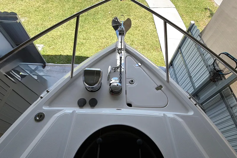 Slide: The Image of 2023 Regal 26 XO boat bow with anchor and deck equipment. - 154