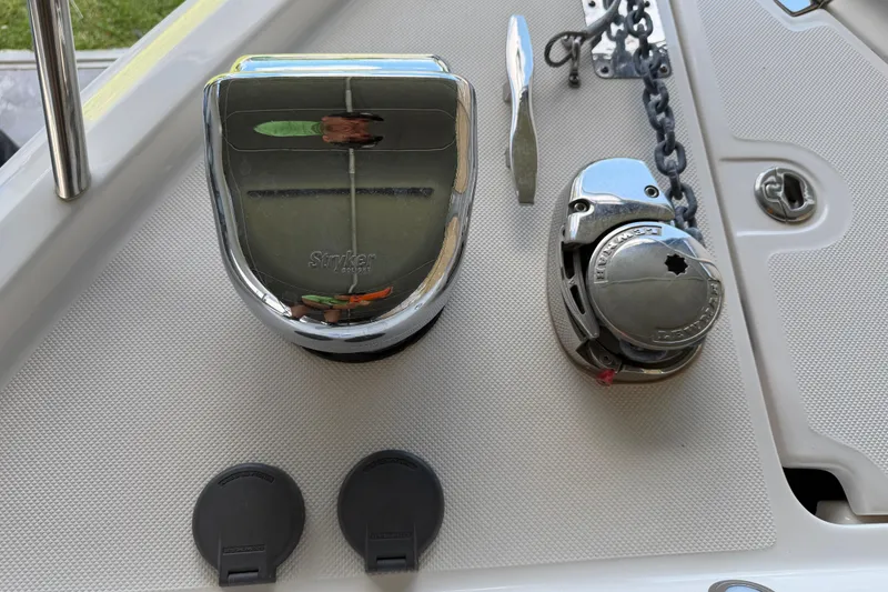 Slide: The Image of 2023 Regal 26 XO boat deck with anchor chain and winch system. - 157
