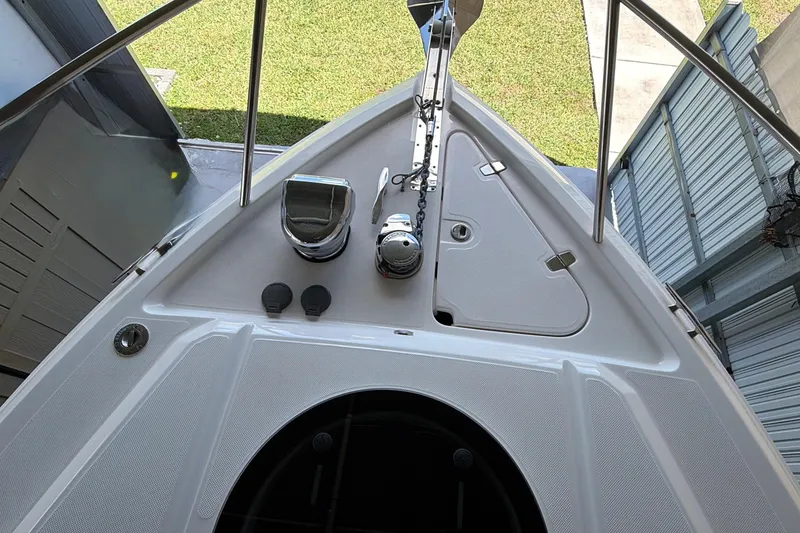 Slide: The Image of 2023 Regal 26 XO boat bow with anchor and deck fittings. - 159