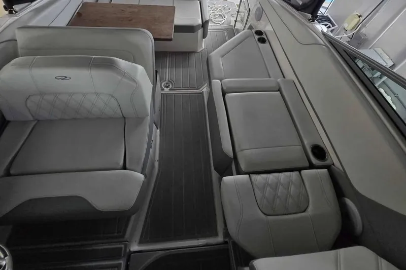 Slide: The Image of 2023 Regal 26 XO boat interior with luxurious seating and modern design. - 20
