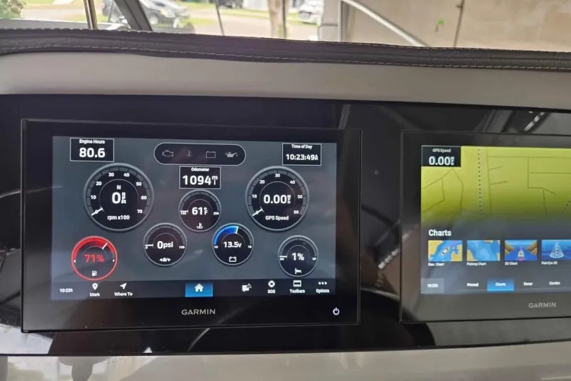 Slide: The Image of Garmin marine display on 2023 Regal 26 XO showing engine and navigation data. - 23
