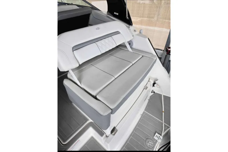 Slide: The Image of 2023 Regal 26 XO boat interior with sleek, modern seating design. - 26