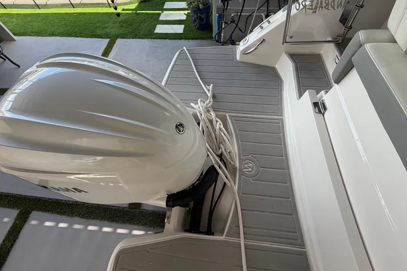 Slide: The Image of 2023 Regal 26 XO boat with Yamaha outboard motor and deck view. - 60