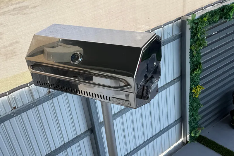 Slide: The Image of Stainless steel grill mounted on a boat, Regal 26 XO, 2023 model. - 69