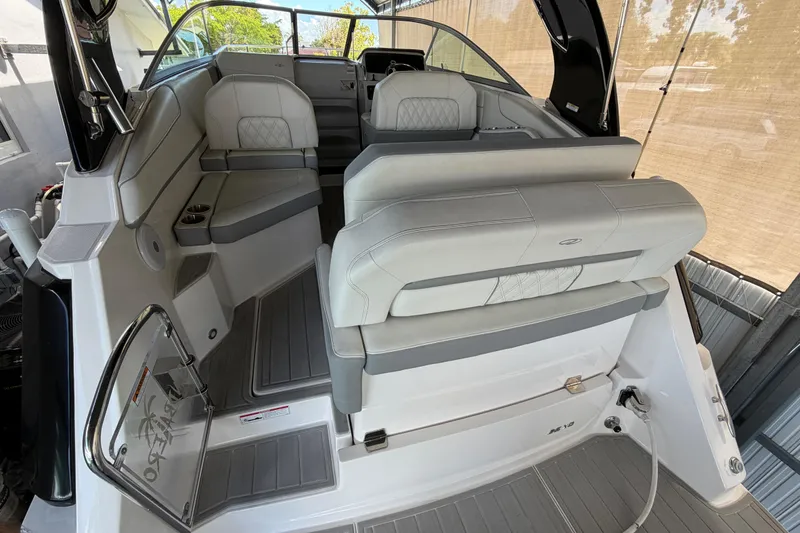 Slide: The Image of 2023 Regal 26 XO boat interior with luxurious seating and modern design. - 72