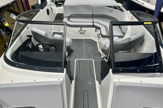 Slide: The Image of 2026 Bayliner V20i boat interior with sleek seating and modern design. - 7