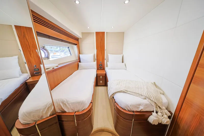 Slide: The Image of Luxurious twin cabin interior of 2015 Sunseeker 75 Yacht with elegant wood finishes. - 13