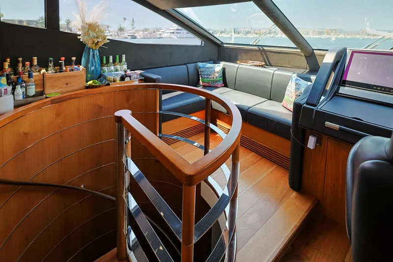 Slide: The Image of Luxurious interior of 2015 Sunseeker 75 Yacht with elegant wood finishes and seating area. - 7