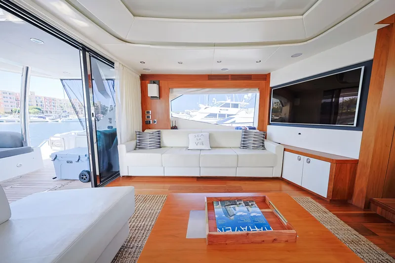 Slide: The Image of Luxurious interior of 2015 Sunseeker 75 Yacht with modern furnishings and marina view. - 8