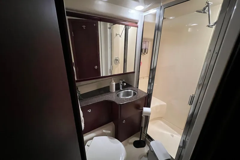 Slide: The Image of Luxurious interior of a 2012 Meridian 341 Sedan yacht with leather seating and modern amenities. - 14