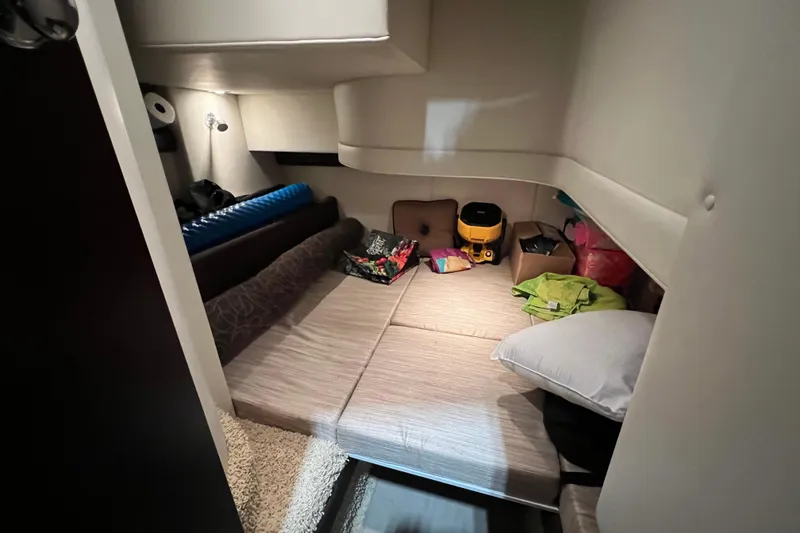 Slide: The Image of Luxurious interior of a 2012 Meridian 341 Sedan yacht with plush seating and modern amenities. - 15