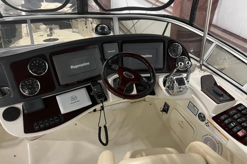 Slide: The Image of 2012 Meridian 341 Sedan yacht deck with wooden flooring and curved stairs. - 21