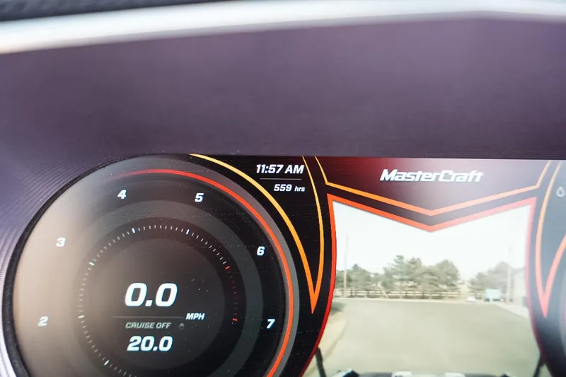 Slide: The Image of Dashboard of a 2019 MasterCraft X24 boat showing speedometer and digital display. - 10