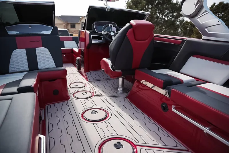 Slide: The Image of Luxurious interior of 2019 MasterCraft X24 boat with red and black seating. - 15