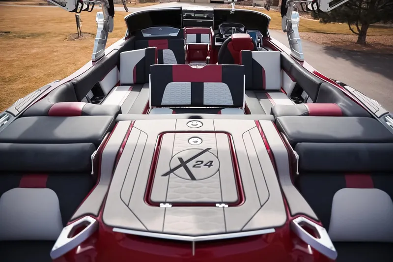 Slide: The Image of 2019 MasterCraft X24 boat interior with luxurious seating and modern design. - 19