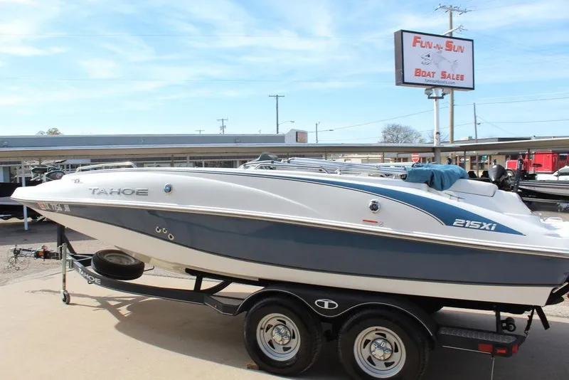 Slide: The Image of 2020 Tahoe 215 Xi boat on trailer at Fun-N-Sun Boat Sales dealership. - 11