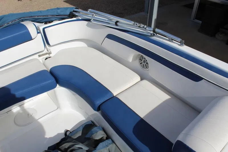 Slide: The Image of Interior of 2020 Tahoe 215 Xi boat with blue and white seating. - 16