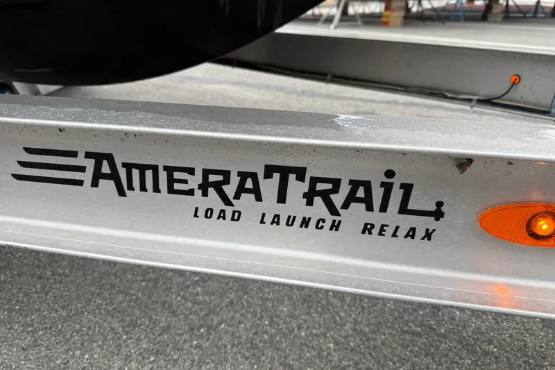 Slide: The Image of AmeraTrail trailer with "Load Launch Relax" slogan, featuring Cobia 220 Center Console, 2022 model. - 3