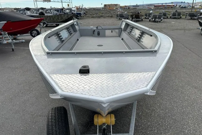 Slide: The Image of 2026 Smoker Craft Pro V Sportsman 2072 TL boat on trailer, front view. - 3