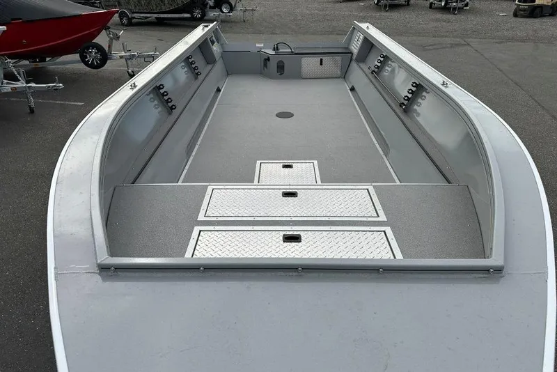 Slide: The Image of 2026 Smoker Craft Pro V Sportsman 2072 TL boat interior with storage compartments. - 4