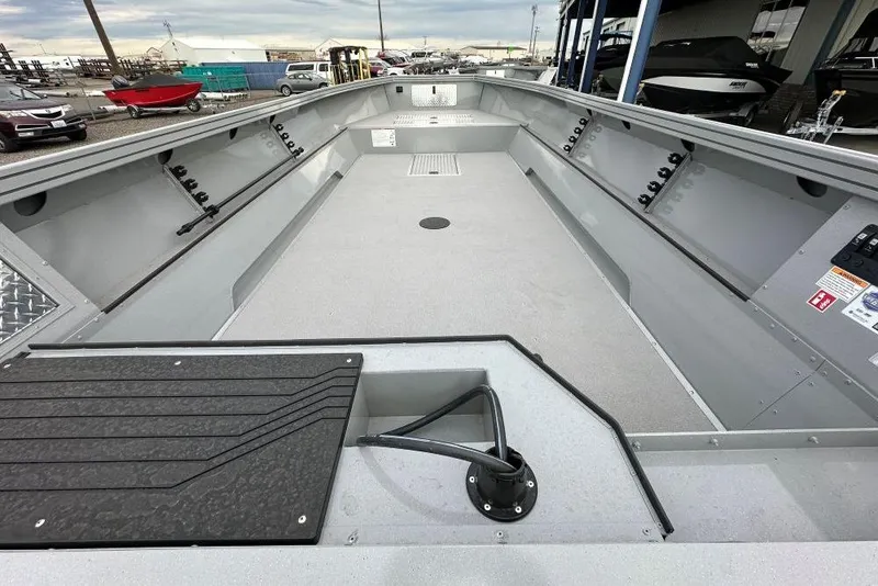 Slide: The Image of 2026 Smoker Craft Pro V Sportsman 2072 TL boat interior, spacious deck, and storage compartments. - 6