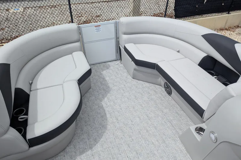 Slide: The Image of Interior of 2026 Trifecta 20CLE pontoon boat with spacious seating and modern design. - 10
