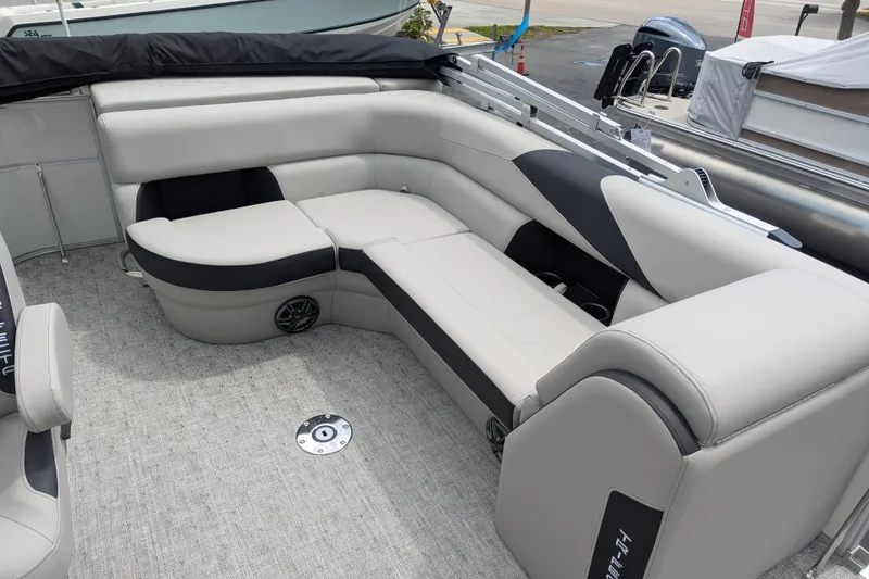 Slide: The Image of Luxurious seating on 2026 Trifecta 20CLE pontoon boat, featuring sleek design and comfortable upholstery. - 11
