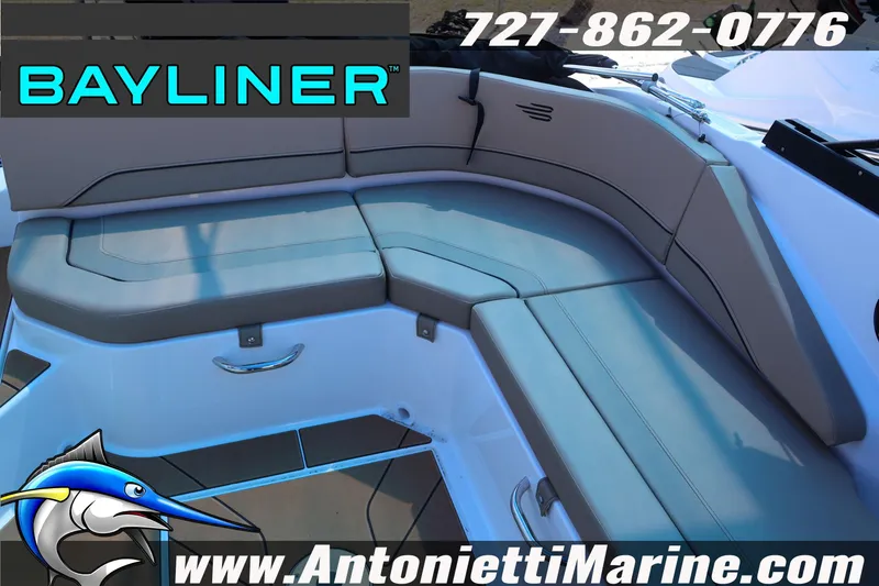 Slide: The Image of 2026 Bayliner V20 boat interior seating with gray cushions, showcased by Antonietti Marine. - 14