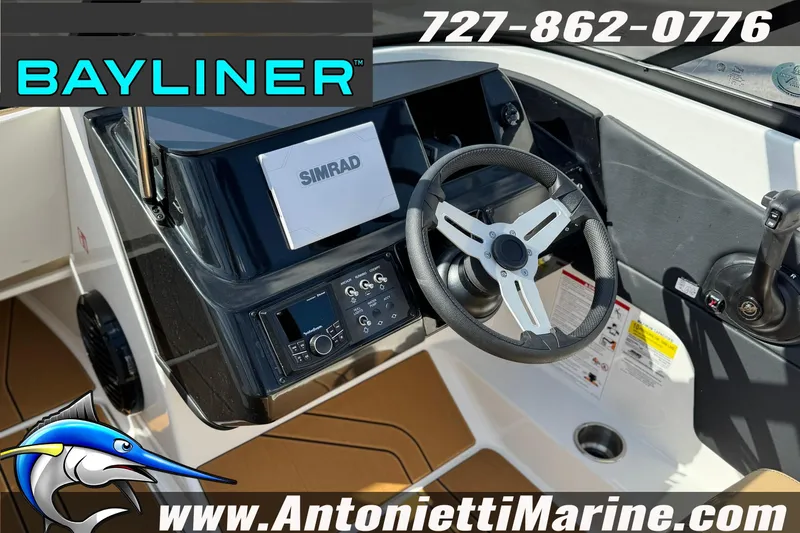 Slide: The Image of 2026 Bayliner V20 boat dashboard with steering wheel and Simrad display. - 15