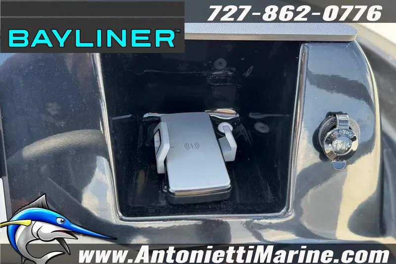 Slide: The Image of Bayliner V20 2026 dashboard with phone holder and 12V socket, Antonietti Marine branding. - 17