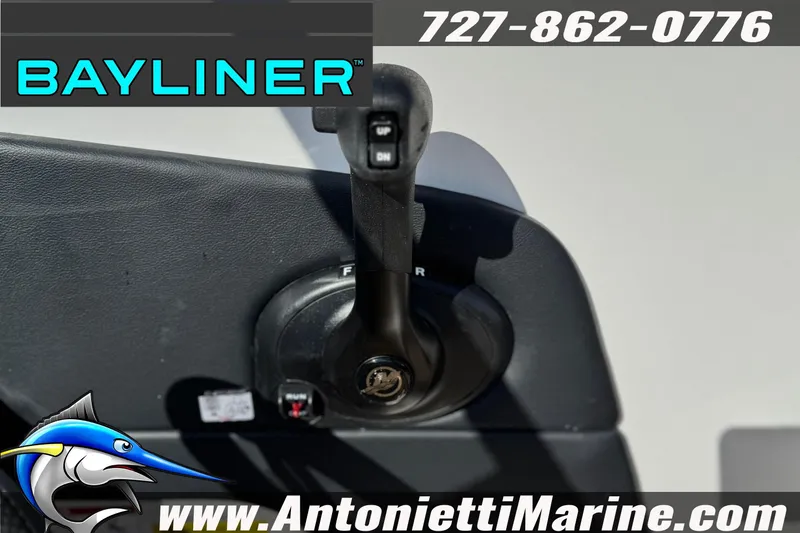 Slide: The Image of Bayliner V20 2026 throttle control with contact information and logo. - 20