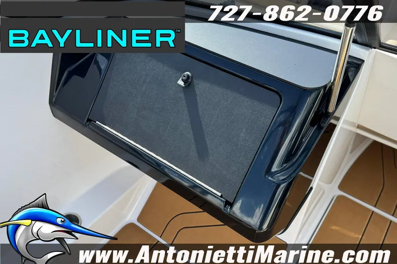 Slide: The Image of Bayliner V20 2026 boat dashboard with logo and contact details. - 21